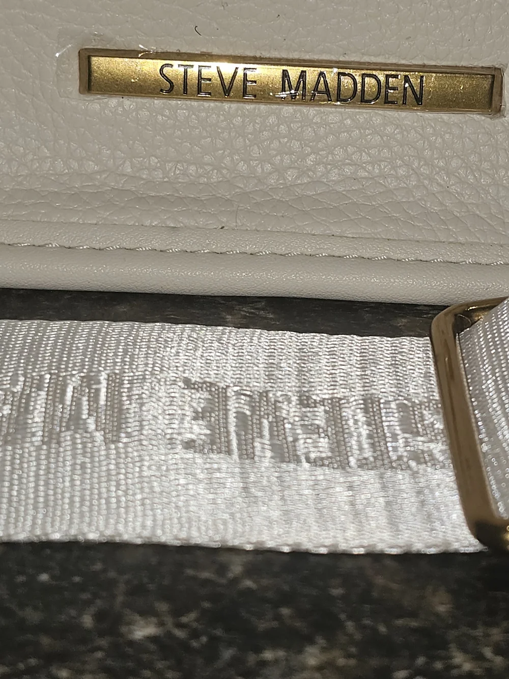 Steve Madden 14 across
